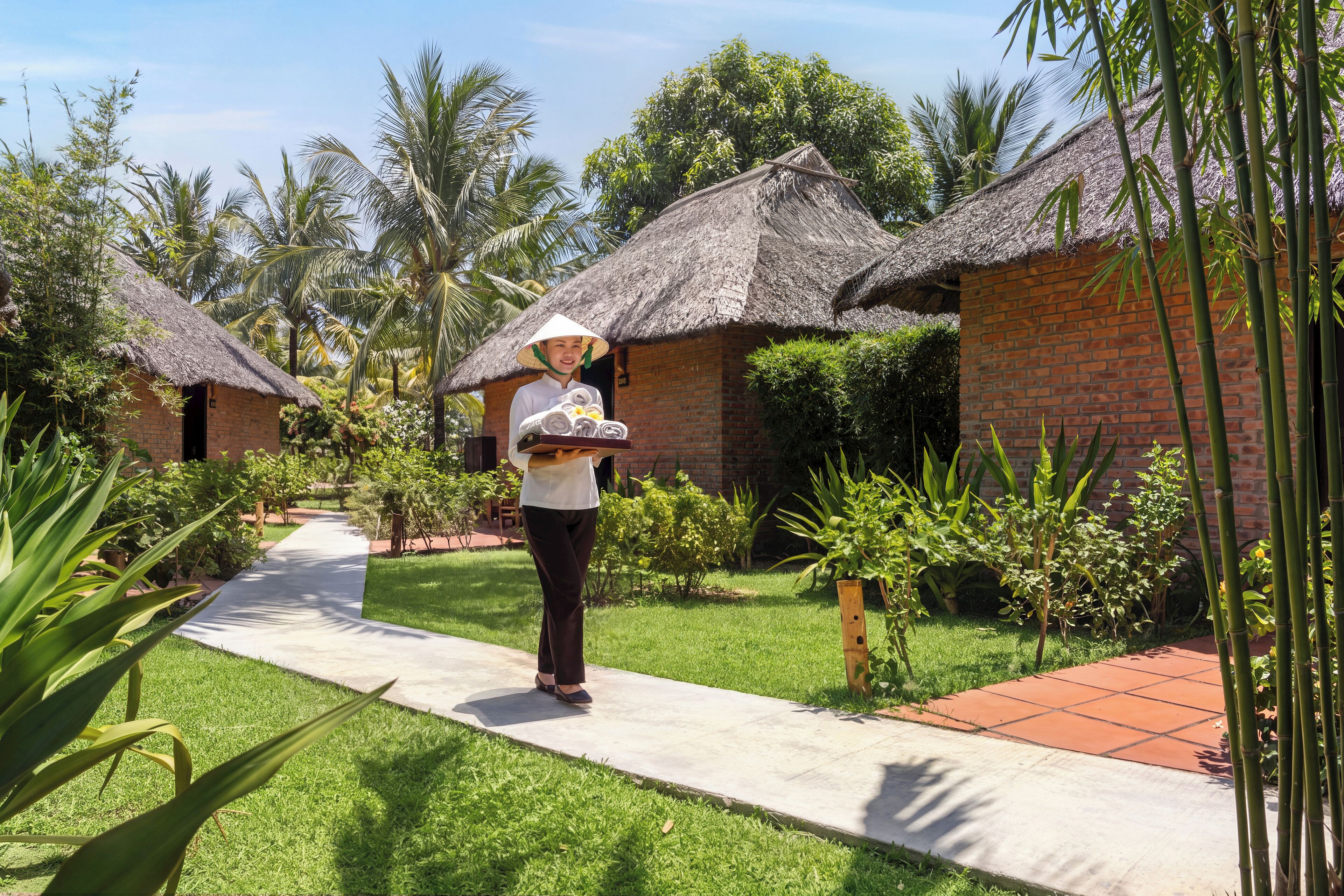 Vietnamese Style Family Bungalow | Minibar, in-room safe, WiFi (free), bed sheets