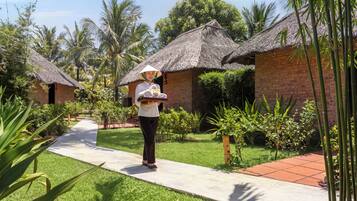 Vietnamese Style Family Bungalow | Minibar, in-room safe, WiFi (free), bed sheets