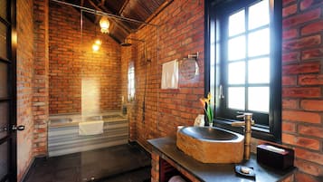 Separate bathtub and shower, rainfall showerhead, hair dryer, bathrobes