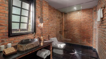 Separate tub and shower, rainfall showerhead, hair dryer, bathrobes