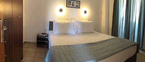 1 chambre, fer et planche à repasser, Wi-Fi, draps fournis