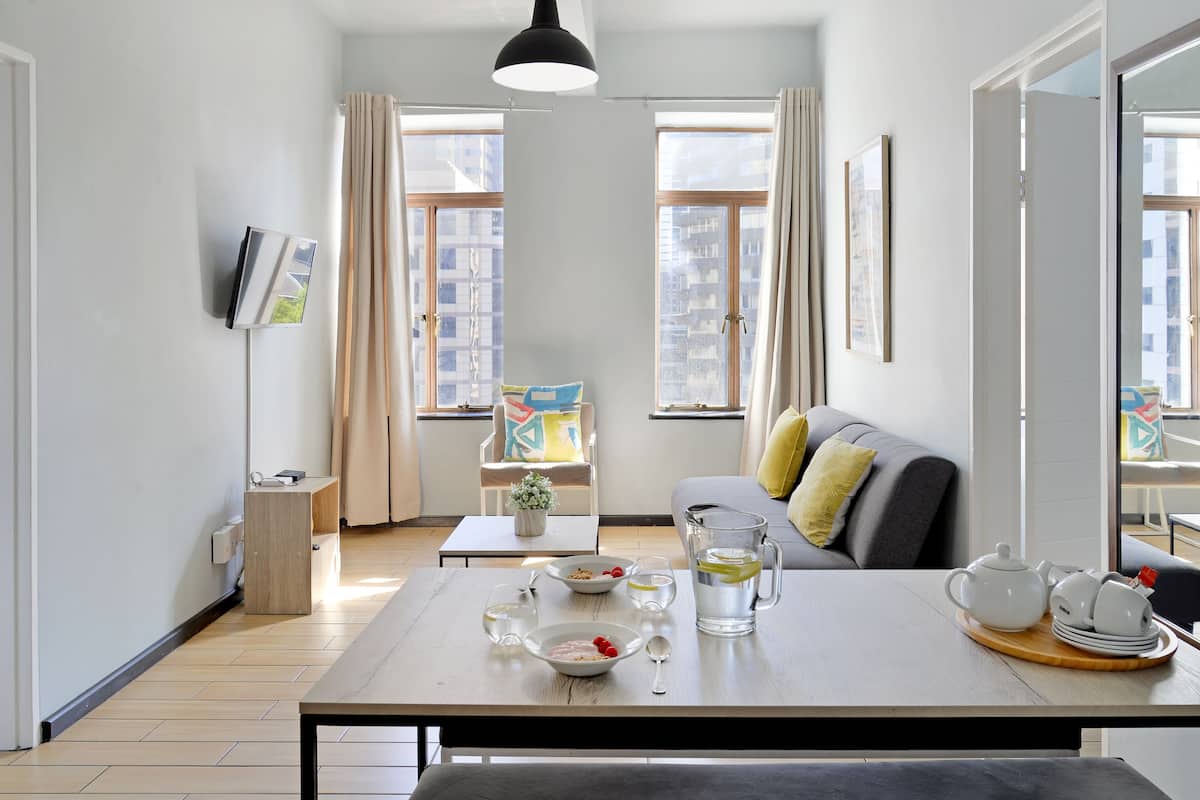 Apartment, 2 Bedrooms | Living area | 32-inch Smart TV with digital channels, streaming services