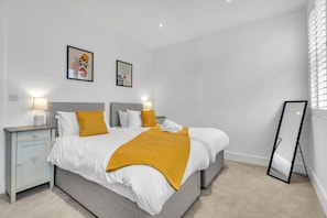 2 bedrooms, laptop workspace, iron/ironing board, bed sheets