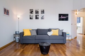 Deluxe Condo | Living area | 55-inch Smart TV with digital channels - notaMi - Cinque Vie Top Floor City Center (Milan)