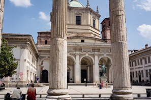A historic building with classical architecture, featuring columns and arches.