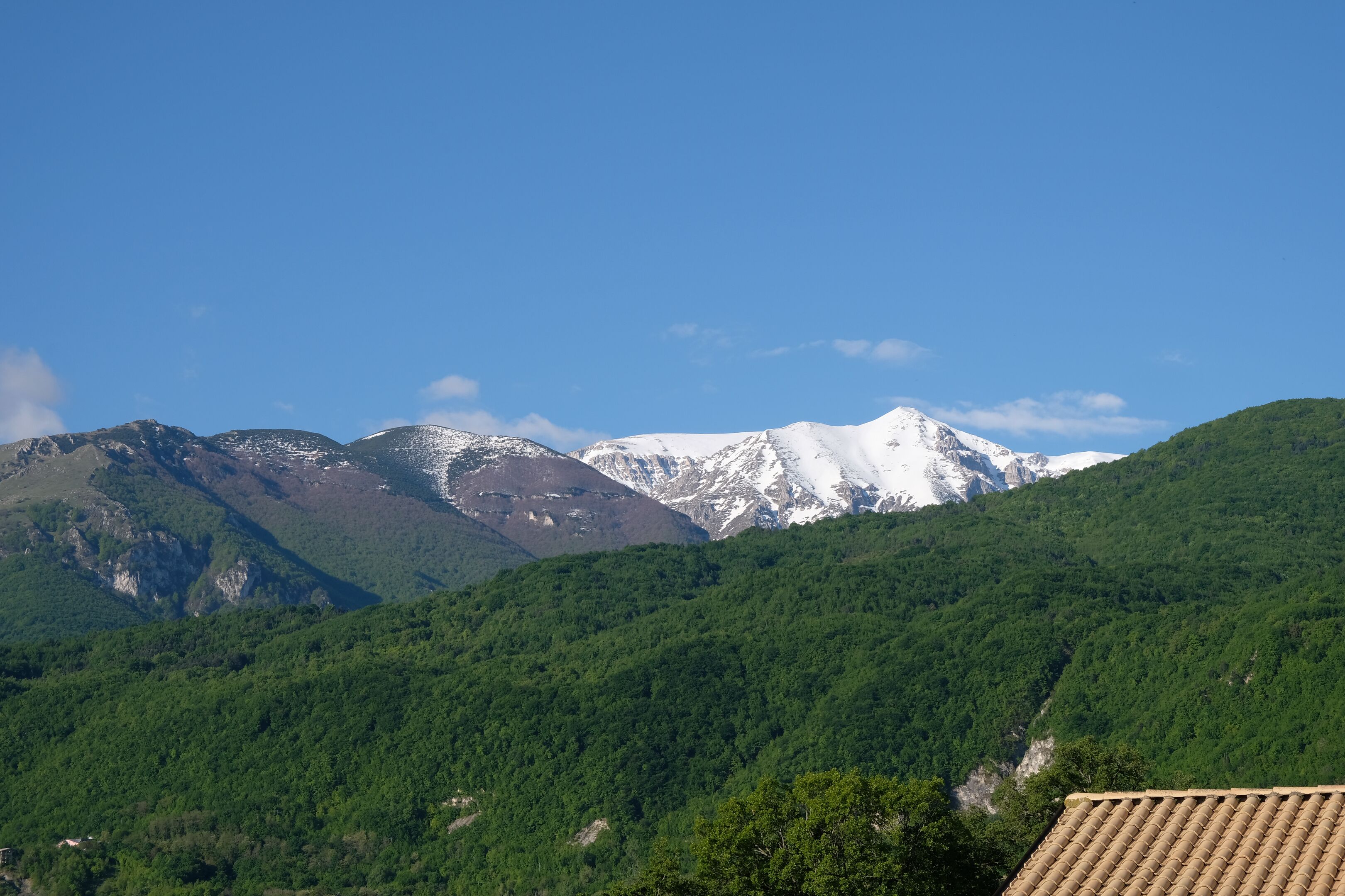A mountainous landscape with a clear sky.