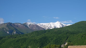 A mountainous landscape with a clear sky.