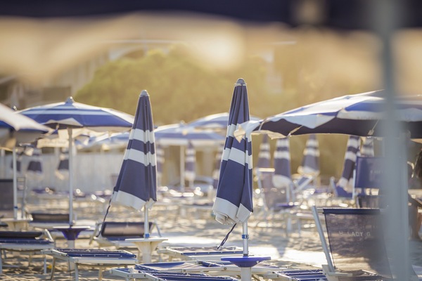 Private beach, white sand, sun loungers, beach umbrellas