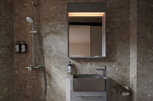 Shower, free toiletries, hair dryer, slippers