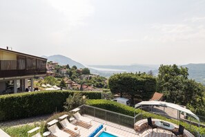 Relax by the pool surrounded by a scenic mountain view.