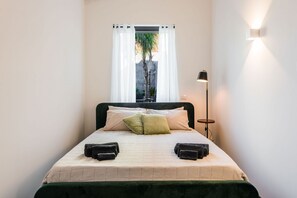 1 habitación, tabla de planchar con plancha, wifi gratis y ropa de cama 