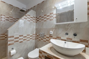 Shower, rainfall showerhead, hair dryer, towels