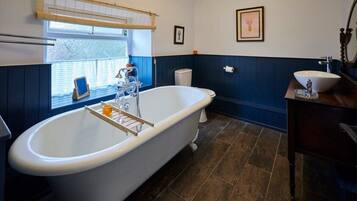 Bathtub, hair dryer, towels