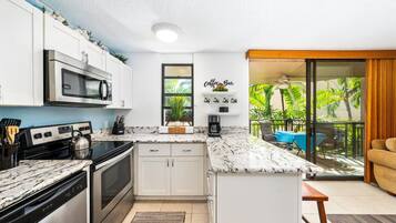 Condo, 1 Bedroom | Private kitchen | Dishwasher, cookware/dishes/utensils