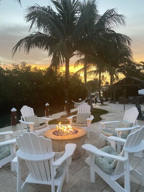 Terrace/patio - Tropical waterfront oasis with private dock, pool, waterfall spa, tiki huts. (Jupiter)