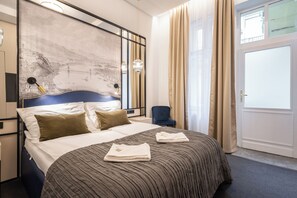 Habitació Deluxe | 1 dormitori, escriptori, wifi gratuïta i roba de llit 