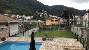 Suite | Pool | Outdoor pool, pool loungers