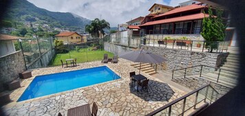 Suíte | Piscina | Piscina externa, espreguiçadeiras