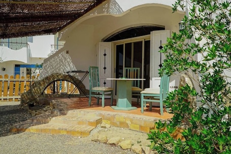 Outdoor dining. WHITE VILLA No. 8