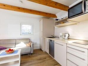 Fridge, microwave, dishwasher, cookware/dishes/utensils