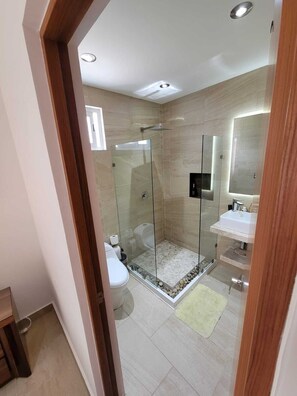 Shower, hair dryer, towels, soap