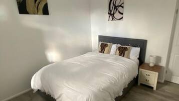2 dormitorios, tabla de planchar con plancha, wifi gratis y ropa de cama