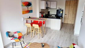 Family Apartment, 2 Bedrooms | Private kitchen | Full-sized fridge, microwave, cookware/dishes/utensils, freezer - Toscana Loft Apartasuites Bogotá (Bogotá)