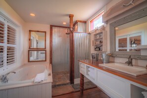 Shower, jetted tub, rainfall showerhead, hair dryer