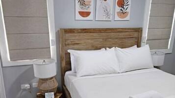 1 habitación, tabla de planchar con plancha, wifi gratis y ropa de cama