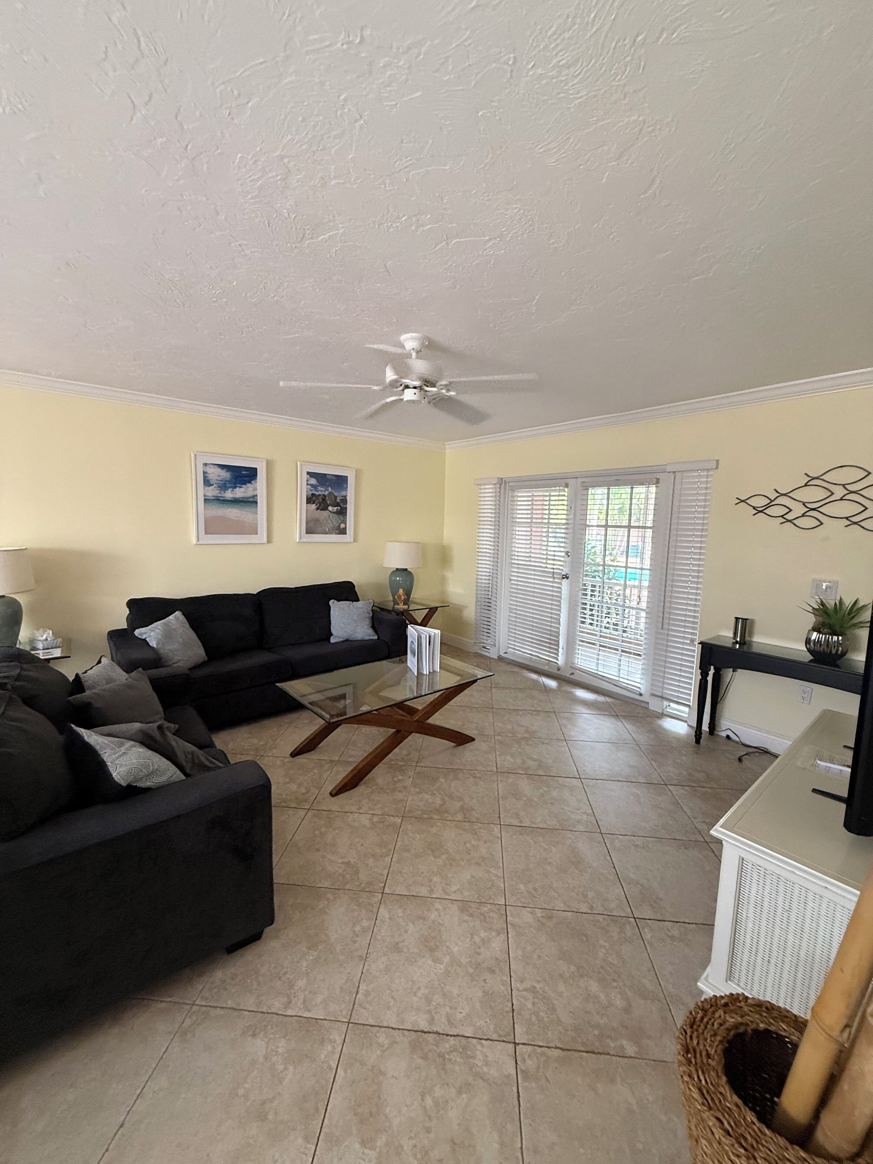 Deluxe Condo, 2 Bedrooms | Living area | Flat-screen TV