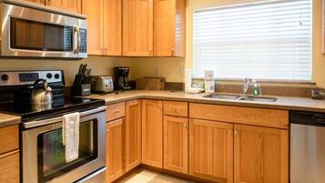 Premier Condo | Private kitchen | Full-size fridge, microwave, oven, stovetop