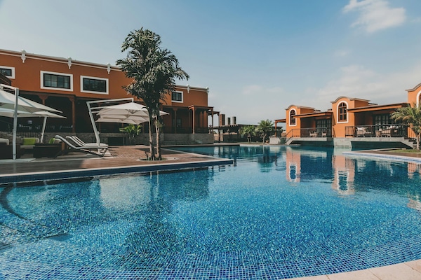 2 outdoor pools, pool umbrellas, sun loungers