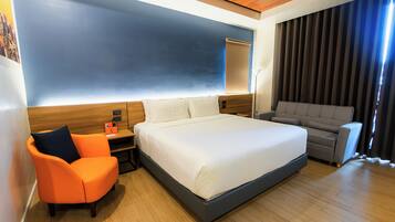Signature Room | Minibar, desk, blackout curtains, soundproofing