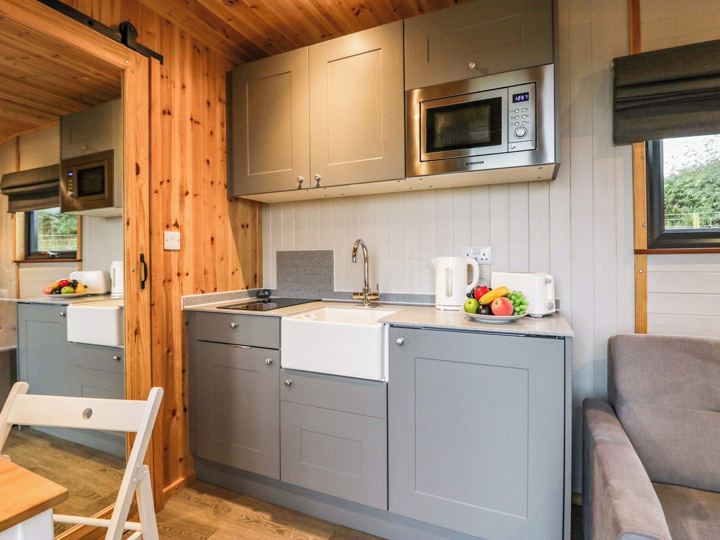 Fridge, electric kettle, cookware/dishes/utensils