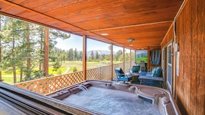 A wooden deck with a hot tub, outdoor seating, and a view of a mountainous landscape. - Game Room, Mtn Views! Unit 1 Mi to Heavenly Resort (Stateline)