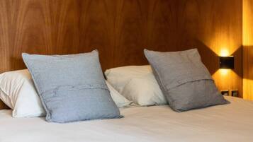 1 bedroom, desk, iron/ironing board, travel crib