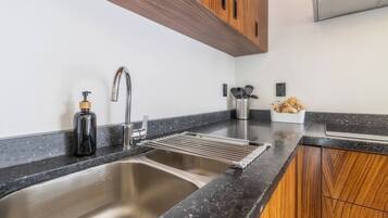 Fridge, microwave, stovetop, coffee/tea maker