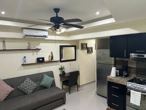 Fridge, microwave, stovetop, coffee/tea maker