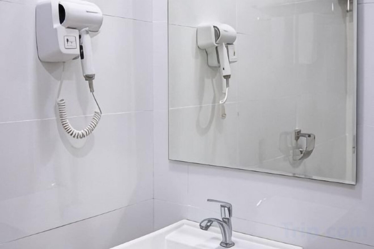 Shower, free toiletries, hair dryer, slippers