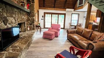 Smart TV, fireplace, books