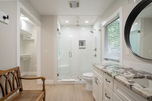 Shower, hair dryer, towels, soap