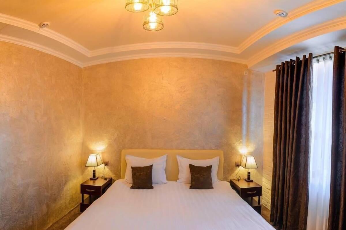 Comfort Double Room Single Use | Down comforters, desk, laptop workspace, blackout drapes