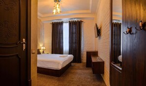 Comfort Double Room Single Use | Down comforters, desk, laptop workspace, blackout drapes