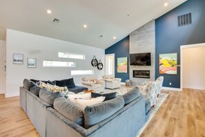 TV, fireplace, books