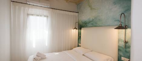 2 dormitorios, caja fuerte, tabla de planchar con plancha y wifi gratis