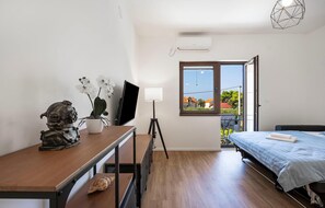 1 Schlafzimmer, Reisekinderbett, kostenloses WLAN, Bettwäsche