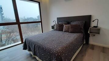 Apartamento exclusivo | Edredones de plumas, caja fuerte, espacio para trabajar con un portátil