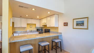 Condo | Private kitchen | Full-size fridge, microwave, oven, stovetop