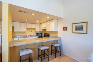 Condo | Private kitchen | Full-size fridge, microwave, oven, stovetop
