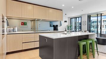 Deluxe Apartment | Private kitchen | Full-size fridge, oven, stovetop, dishwasher